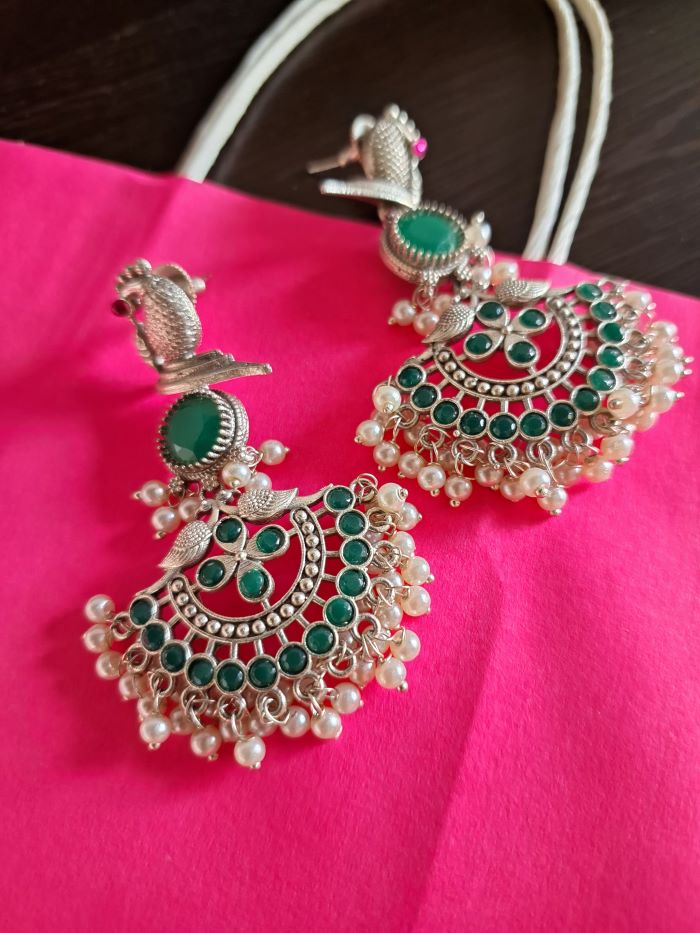 Tiyasha green dangler earrings
