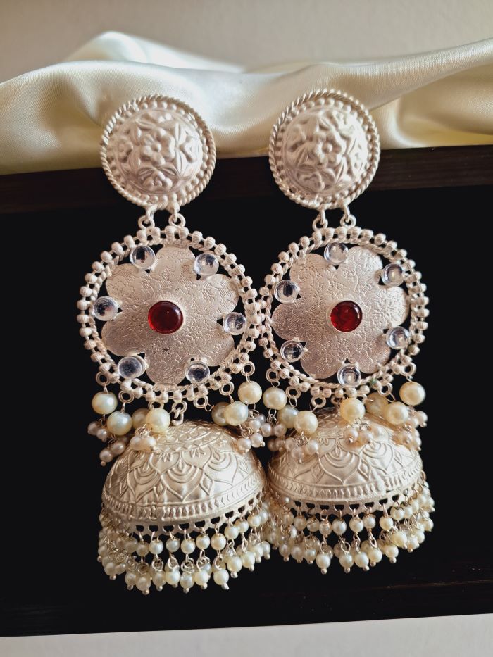 Raveena red silver polish jhumki earrings