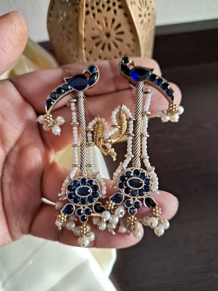 Akshara Veena pattern dual tone brass long studs - Dark blue