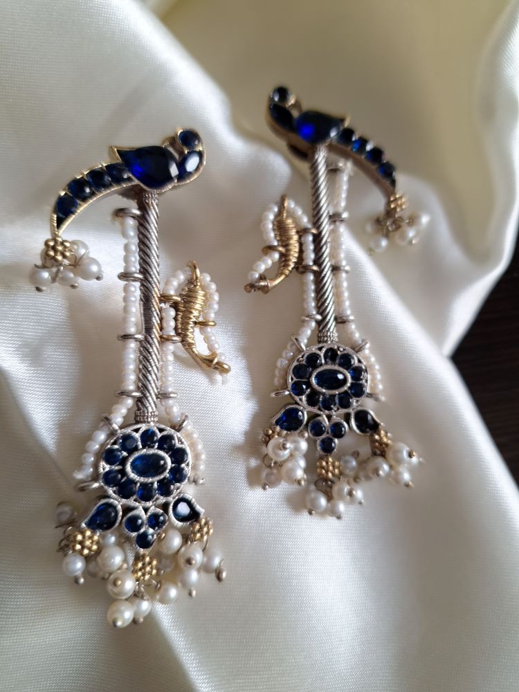 Akshara Veena pattern dual tone brass long studs - Dark blue