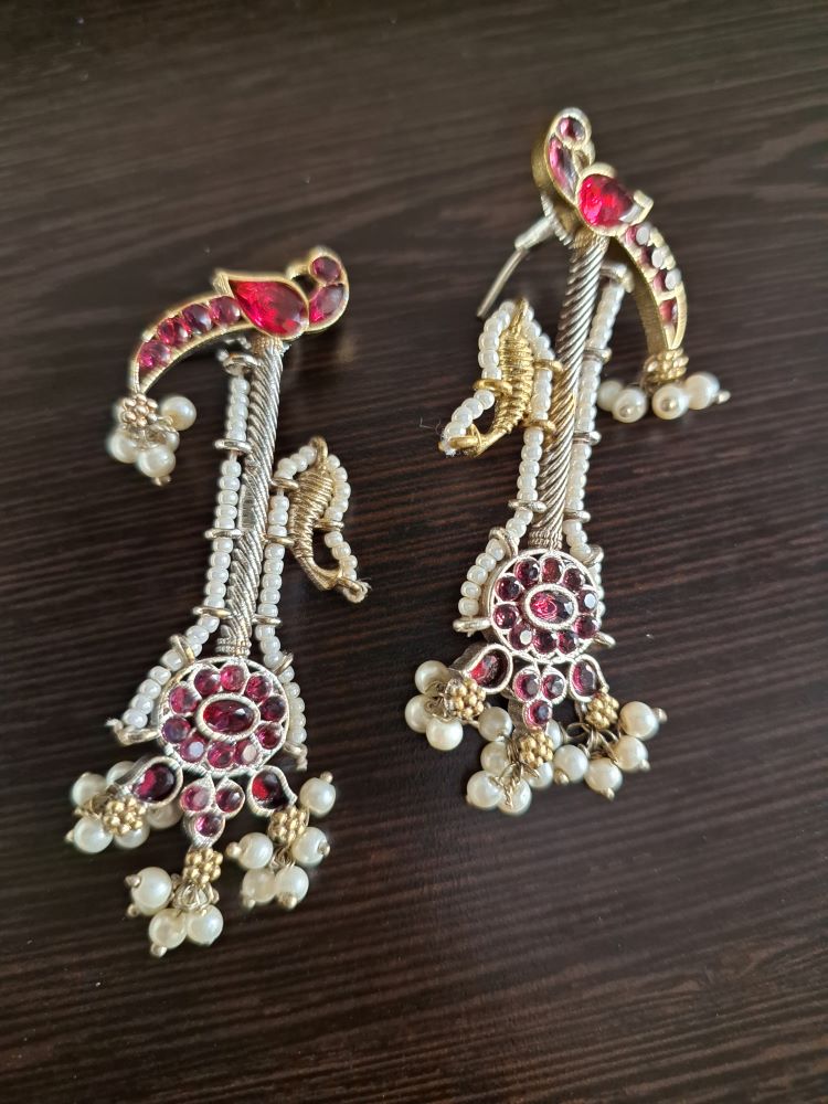 Akshara Veena pattern dual tone brass long studs - Maroon