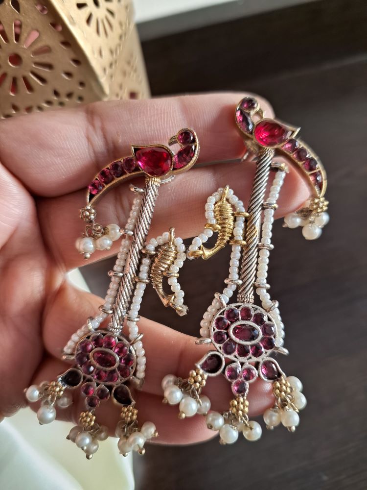 Akshara Veena pattern dual tone brass long studs - Maroon