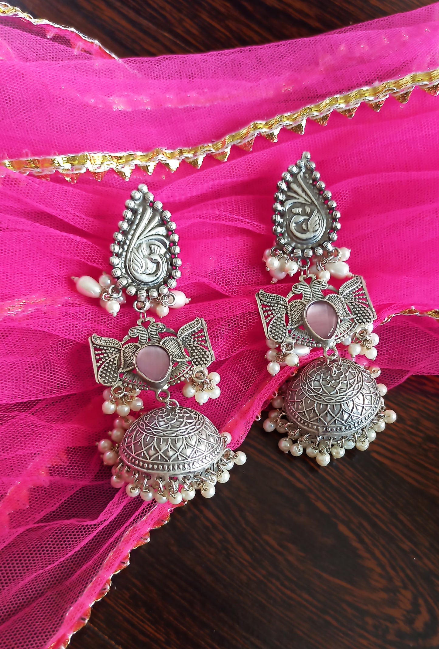 Padmini Silver Polish Brass Jhumki earrings with light pink monalisa stone