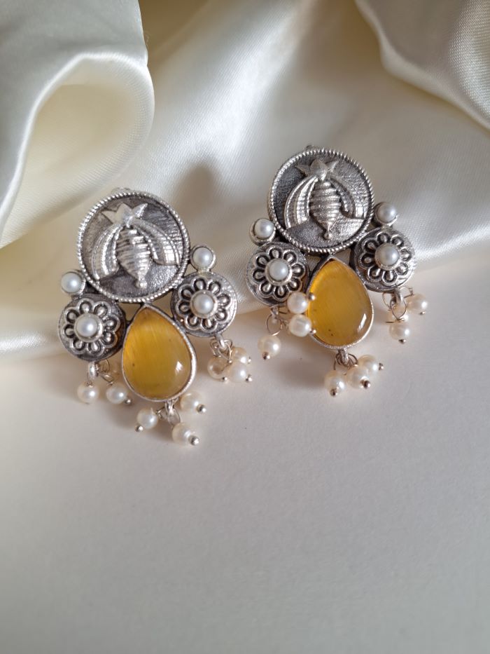 Karma yellow stud earrings