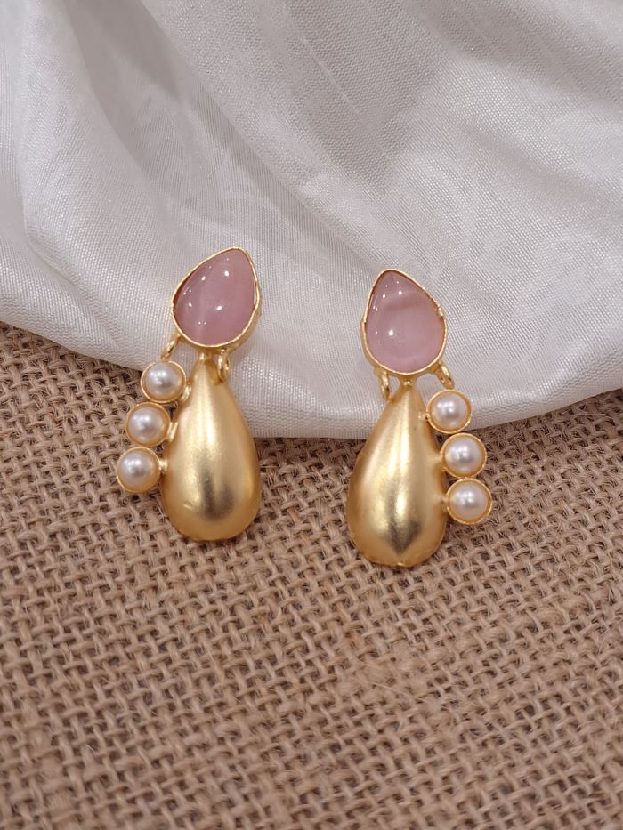 Madiha blush pink studs earrings.