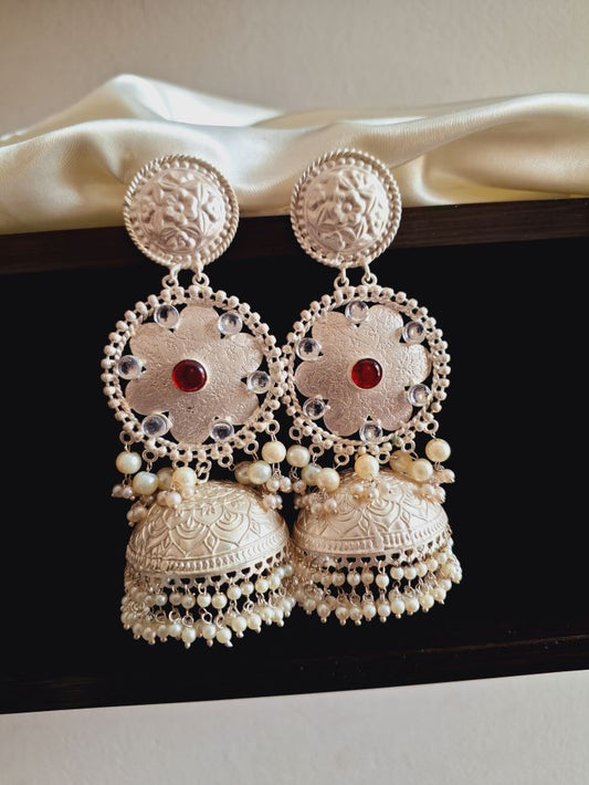 Raveena red silver polish jhumki earrings