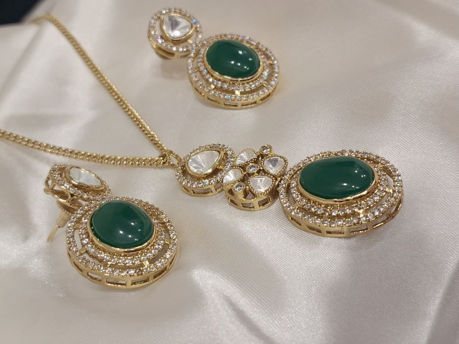 Swastika emerald polki moissanite pendant set with AD