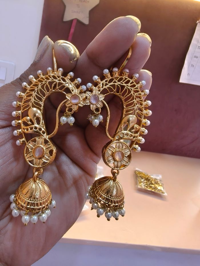 Taani peach cuff jhumka earrings