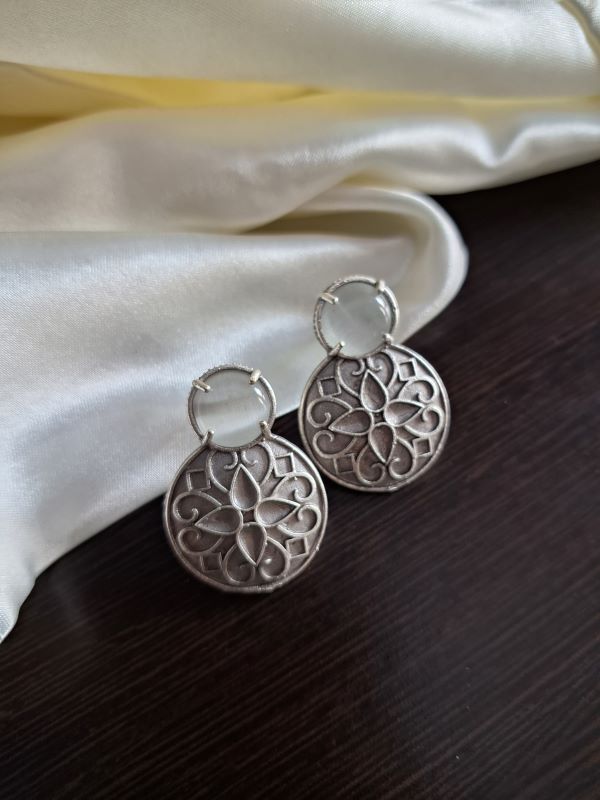 Taara white studs earrings