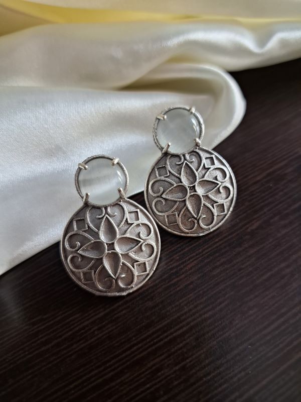 Taara white studs earrings