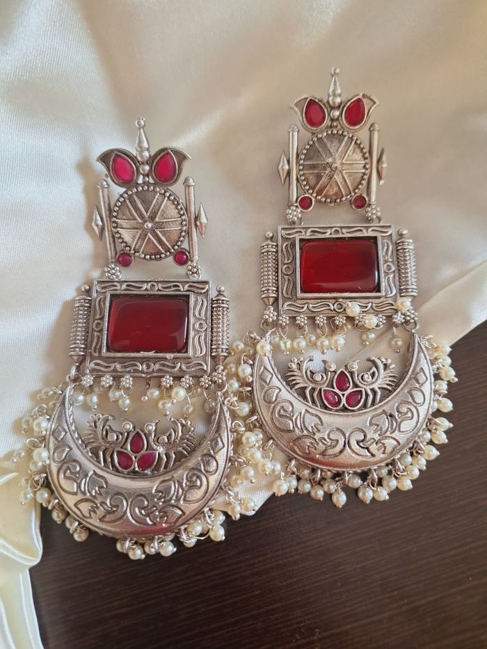 Zoya red silver lookalike chandbali earrings